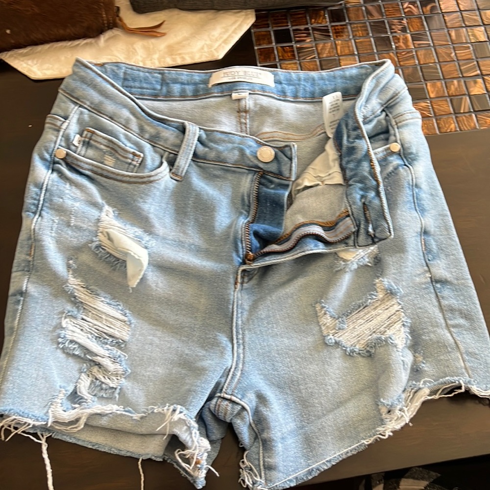 Judy, blue distressed shorts, size large, like new